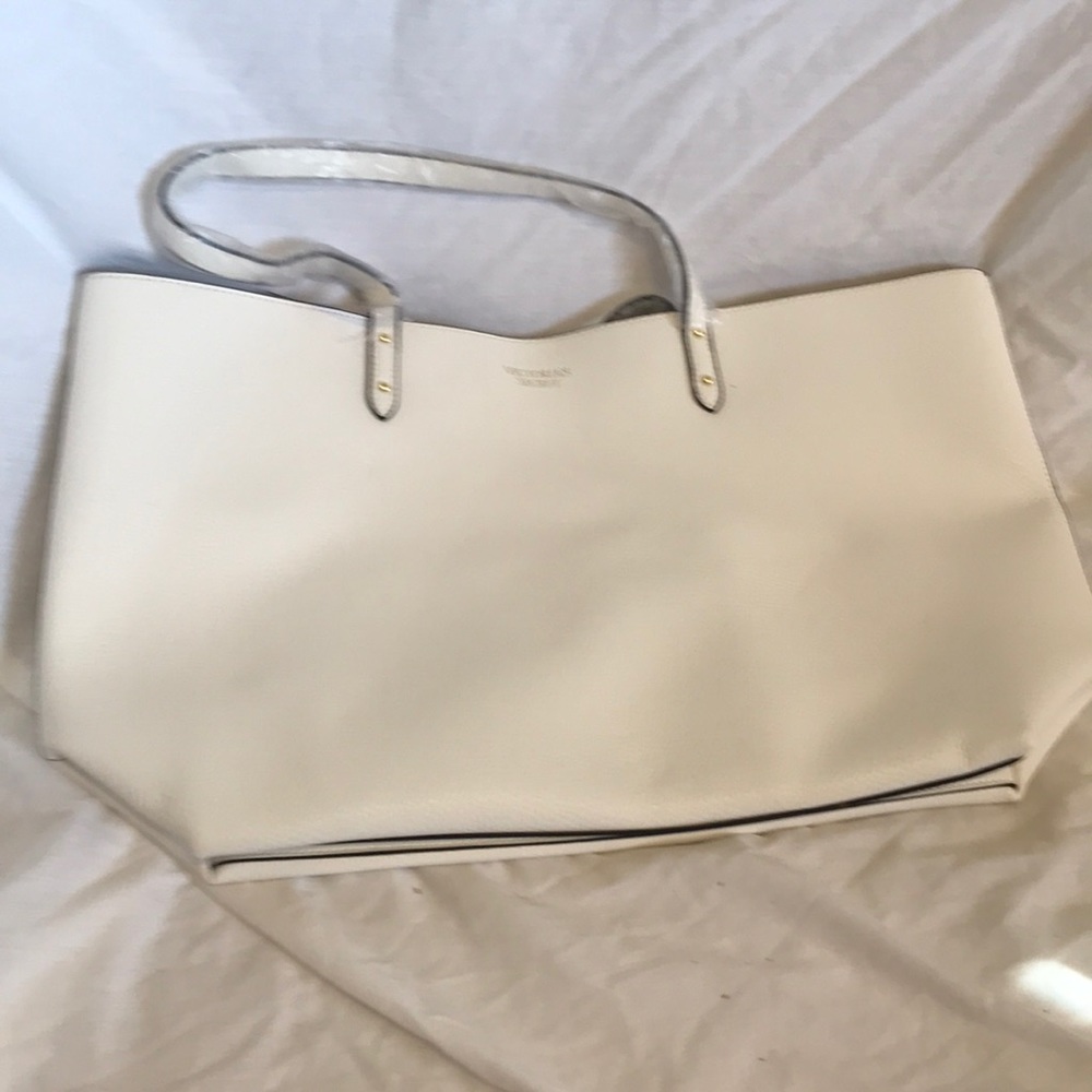 Large white tote and small clutch